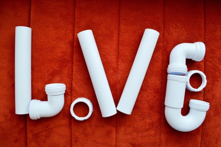 Love spelled out with plumbing pipes