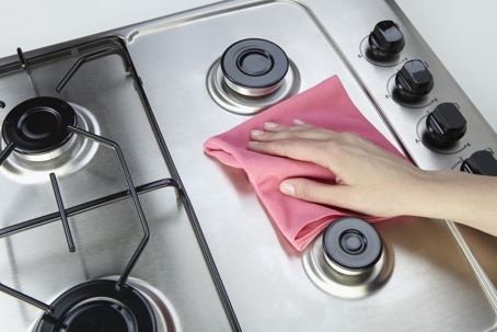 cleaning stovetop