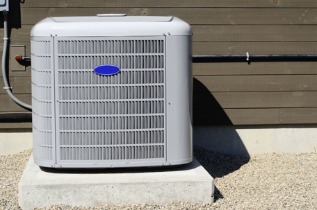 outdoor air conditioning unit on concrete slab