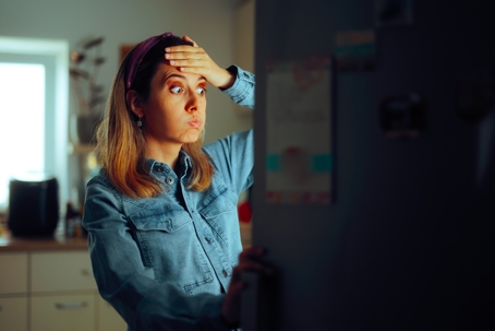 Woman having problems with freezer.