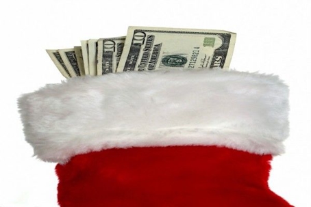 Christmas stocking filled with money