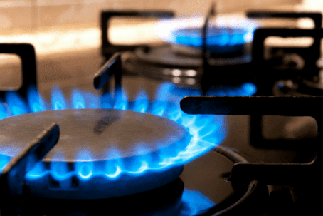 lit burner on gas stovetop