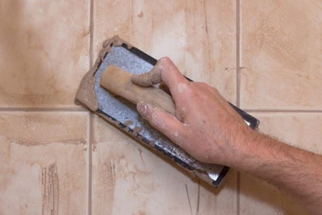 grouting tiles