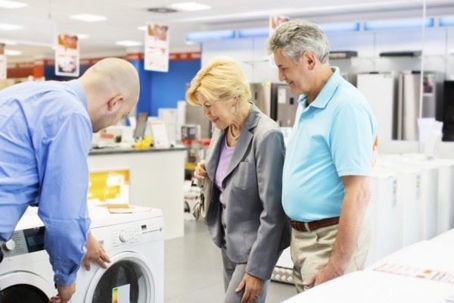 couple shopping for washing machine