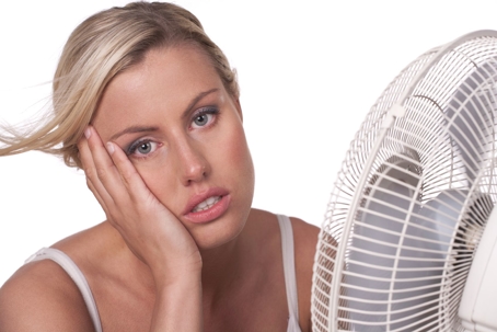 woman in front of fan